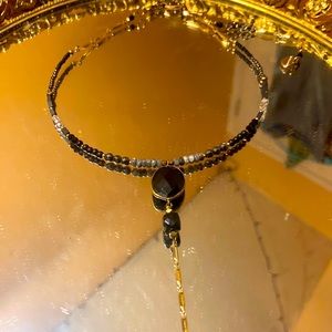 Elegant Black and Gold Beaded Choker with Drop Chain Detail